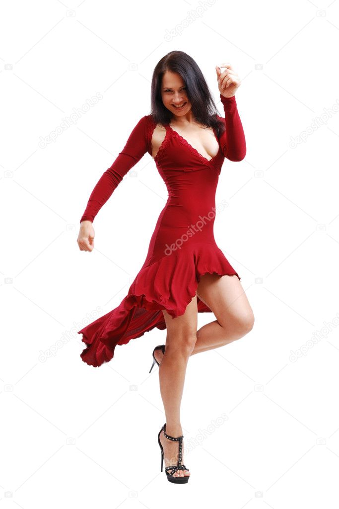 Young woman dancing in cocktail dress