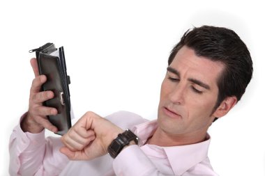 Man looking at the time clipart