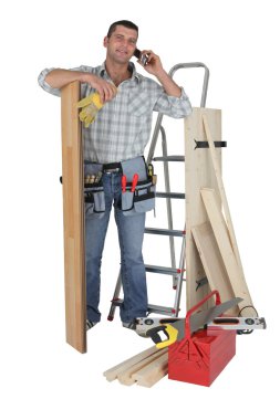 Handyman talking to a supplier clipart