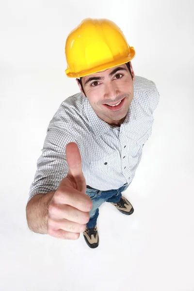 Stavební dělník dává palec nahoru — Stock fotografie