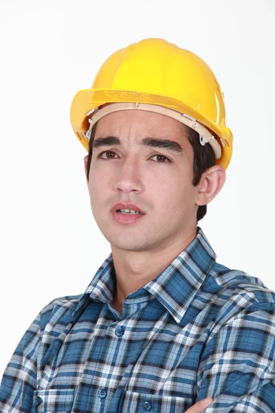 Builder z mylić spojrzeć na twarz — Zdjęcie stockowe
