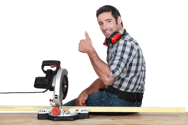 Woodworker using circular saw — Stock Photo, Image