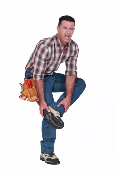 Builder with foot injury — Stock Photo, Image