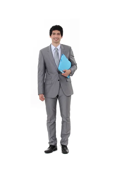 Retrato de um homem de negócios carregando um arquivo — Fotografia de Stock