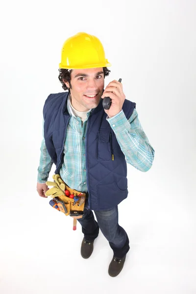 Handwerker telefoniert — Stockfoto