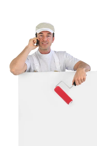 Pintor hablando en su teléfono móvil —  Fotos de Stock