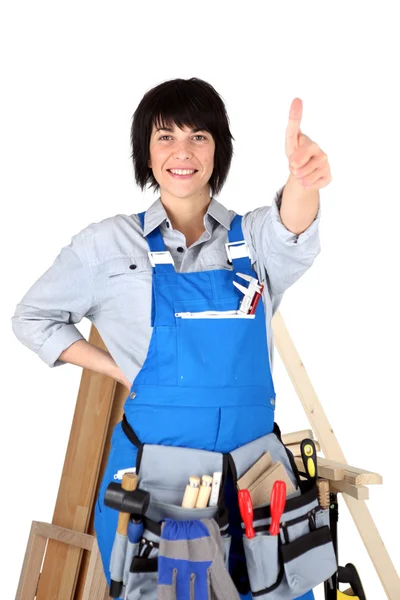 Başparmak-up veren kadın marangoz — Stok fotoğraf