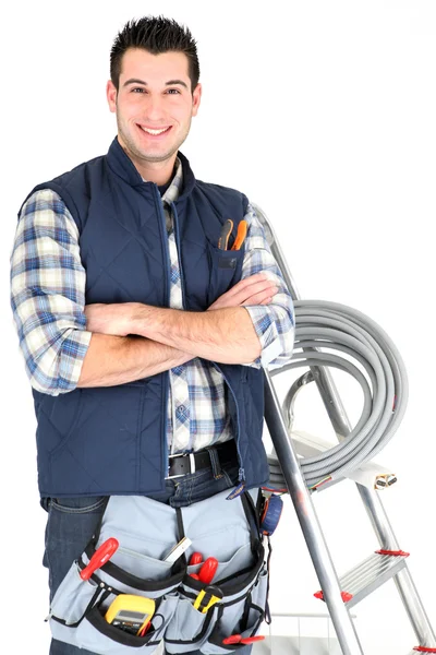 Eletricista com braços cruzados — Fotografia de Stock