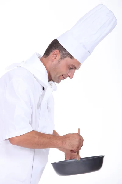 A chef preparing a meal — Stock Photo, Image