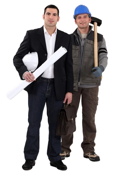 Architect stood by worker with sledge-hammer — Stock Photo, Image