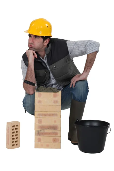 Male bricklayer with confused look on face — Stock Photo, Image