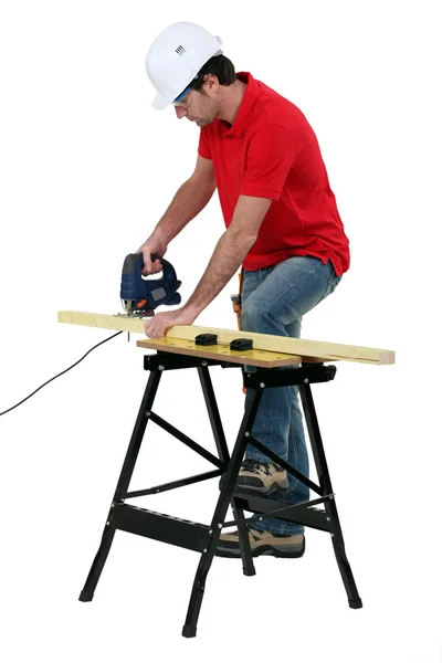 Worker sawing — Stock Photo, Image