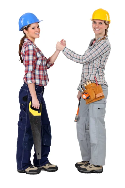 Ženské stavební dělníci tvořící pakt — Stock fotografie