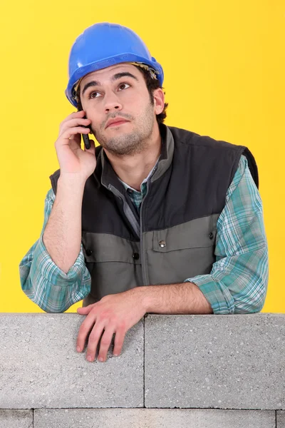 Laborer with cellphone — Stock Photo, Image