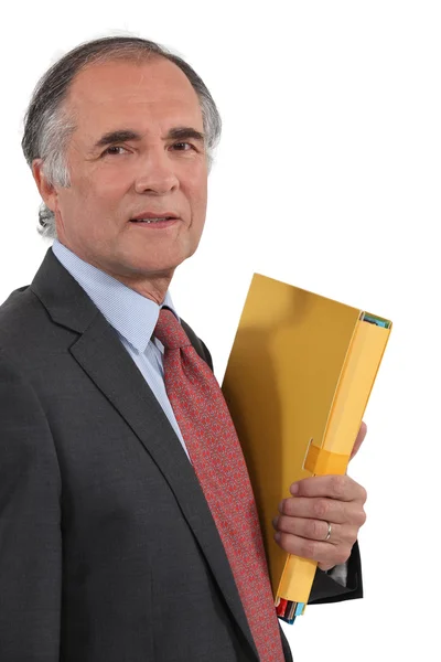 Siwy mężczyzna trzyma folderu — Zdjęcie stockowe