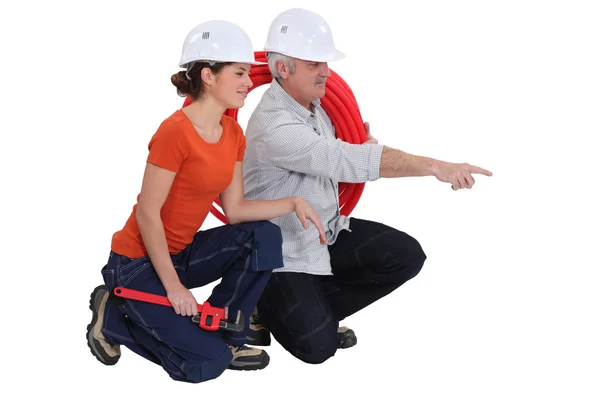 Plumber and female apprentice — Stock Photo, Image
