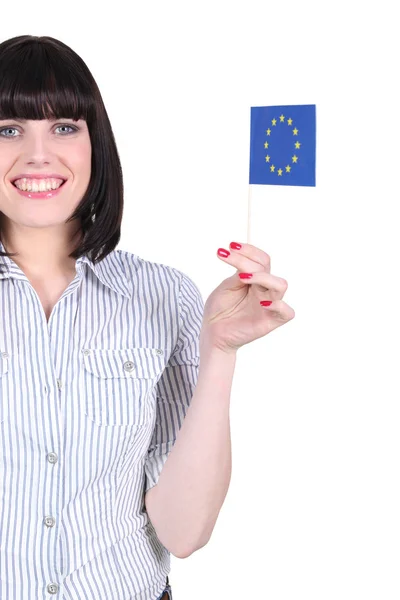 Mujer alegre sosteniendo bandera europea — Foto de Stock