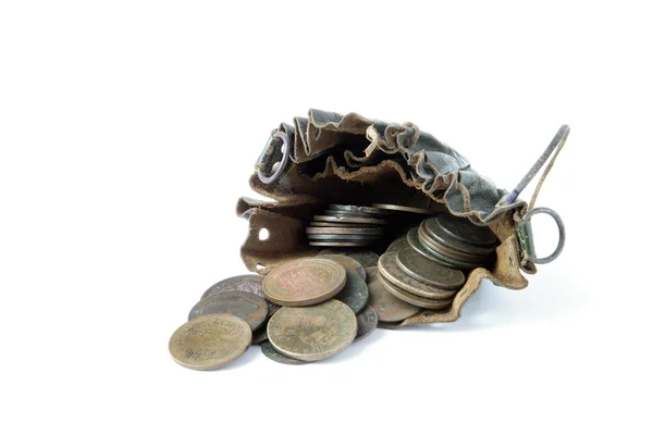 Coins in an old leather pouch — Stock Photo, Image