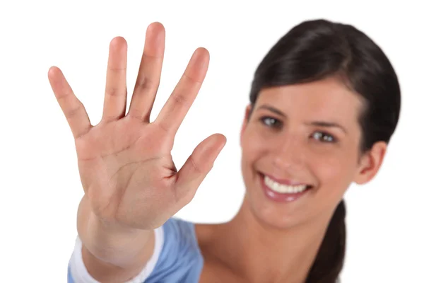 Brunette holding hand in stop gesture — Stock Photo, Image