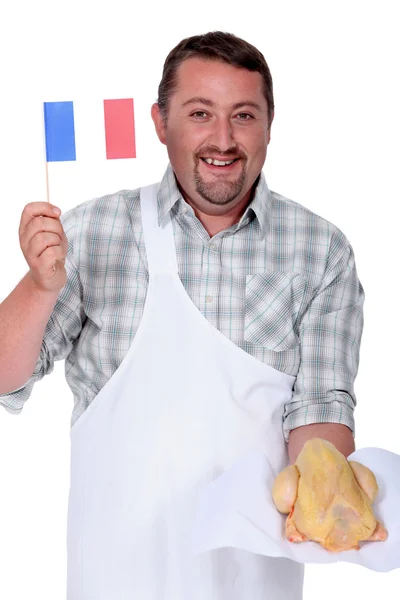 Francês acenando a bandeira para aves de capoeira francesas — Fotografia de Stock