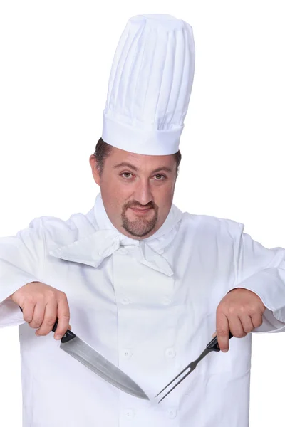 Chef con cuchillo y tenedor —  Fotos de Stock