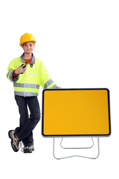 Little girl dressed as a road worker — Stock Photo, Image