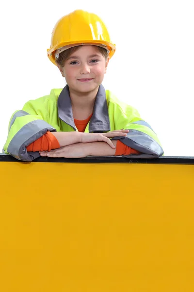 Girl with yellow helmet — Stock Photo, Image