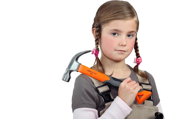 Little girl with hammer — Stock Photo, Image