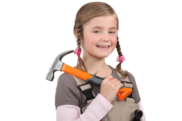 Young girl with a hammer — Stock Photo, Image