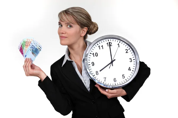 Woman with clock and notes — Stock Photo, Image