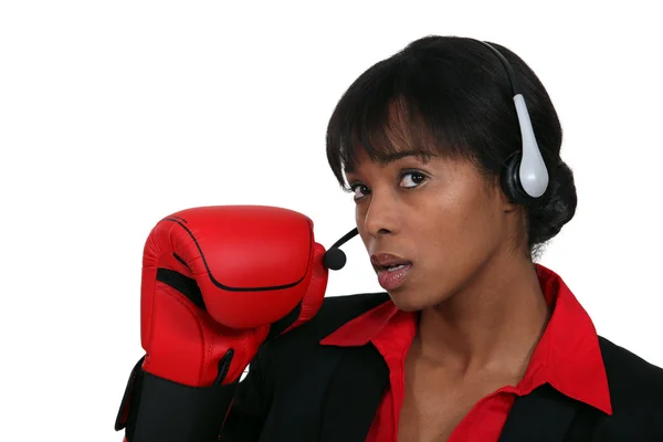 Trabajador del centro de llamadas con guantes de boxeo —  Fotos de Stock