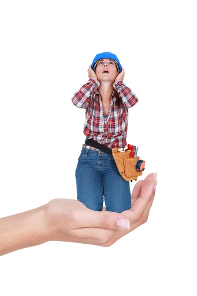 Photomontage of woman building worker looking up — Stock Photo, Image