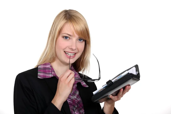 Female office worker with a diary — Stock Photo, Image