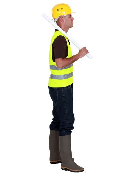 Profile of a worker with plans — Stock Photo, Image