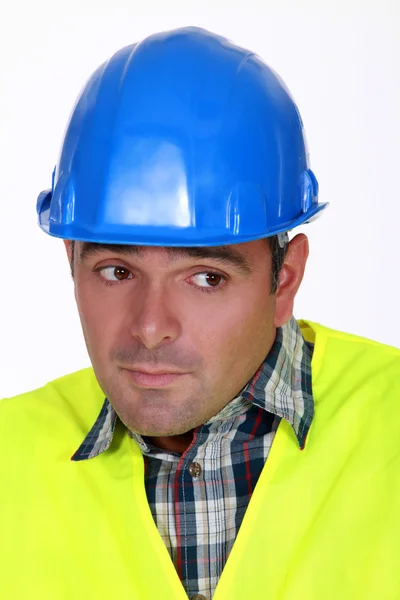 Nervös byggnadsarbetare — Stockfoto