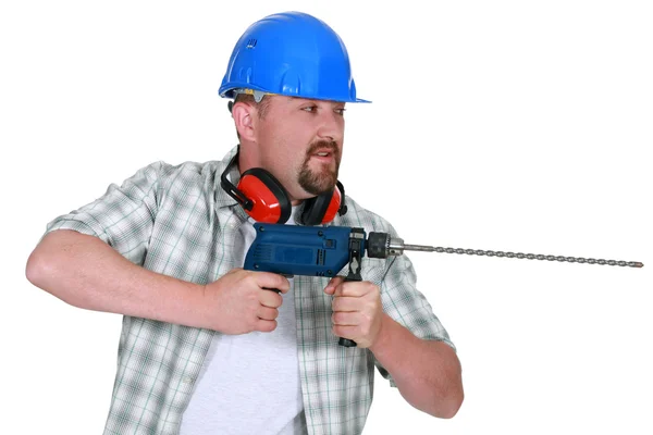 Craftsman holding a drill — Stock Photo, Image