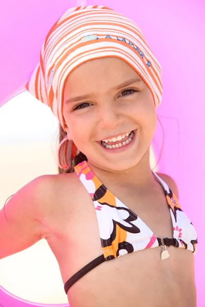 Girl with scarf and float — Stock Photo, Image