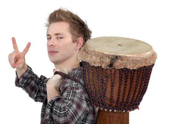 Adam sırtında taşıyan bongo — Stok fotoğraf