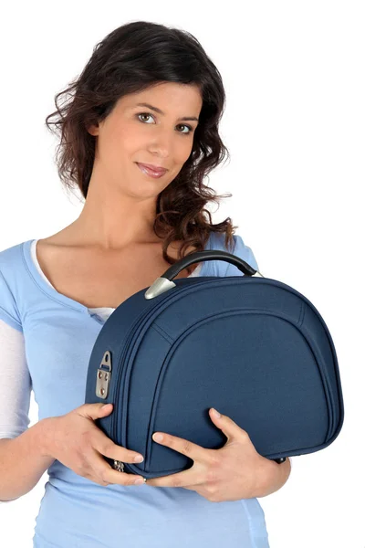 Portrait of a young woman with handbag — Stok fotoğraf