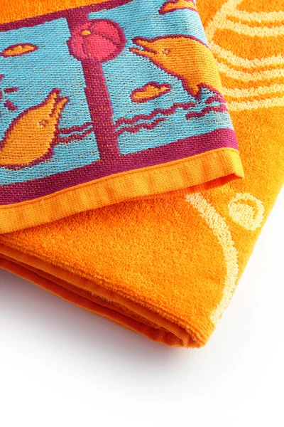 Пляжные полотенца с аккуратной папкой — стоковое фото