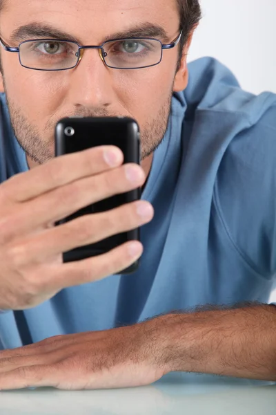 Portrait of a man taking picture with cellphone — Stock Photo, Image