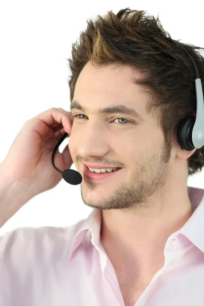 Young man with headset speaking — Stock Photo, Image