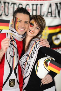 Couple supporting Germany team clipart