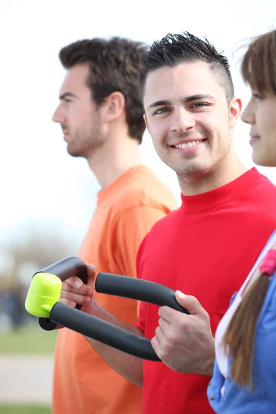 Three friends working out together outside — Stock Photo, Image