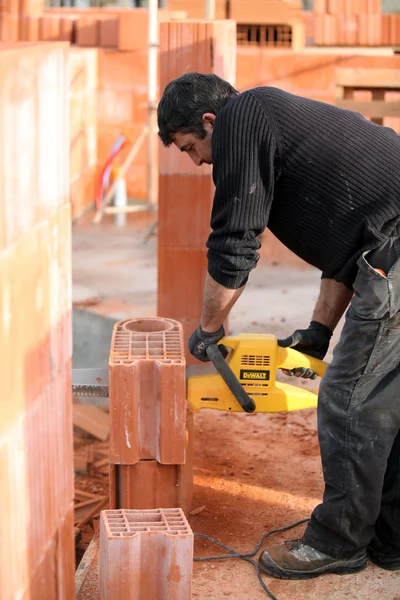 Man using a power tool — Stock Photo, Image