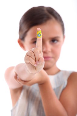 Portrait of a little girl with plaster clipart