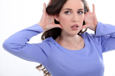 Woman listening to something clipart