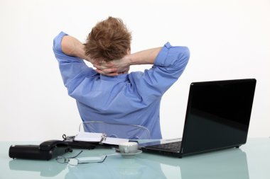 Man taking a break from his work clipart