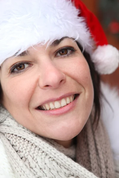 Kvinna i en Santa hatt — Stockfoto