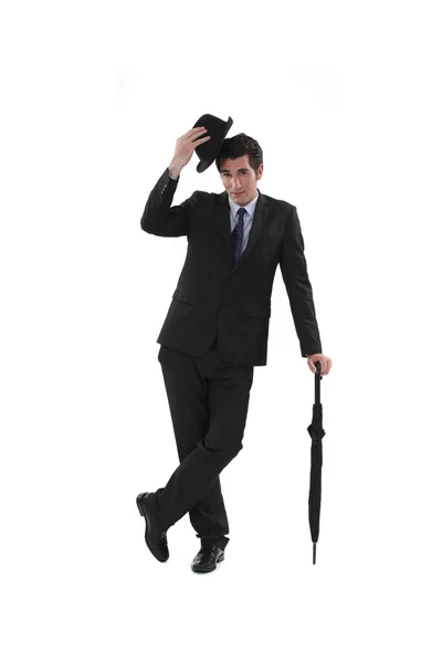 Üzletember, kalap és napernyő — Stock Fotó